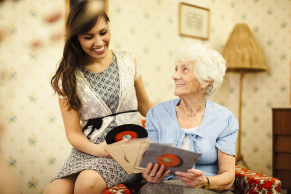 Grandmother and granddaughter together at home